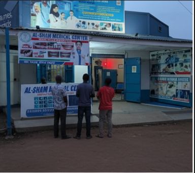 Doctor consulting patient at Al-Sham Medical Center